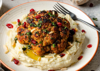 Whole Roasted Cauliflower with Rustic Herb Sauce
